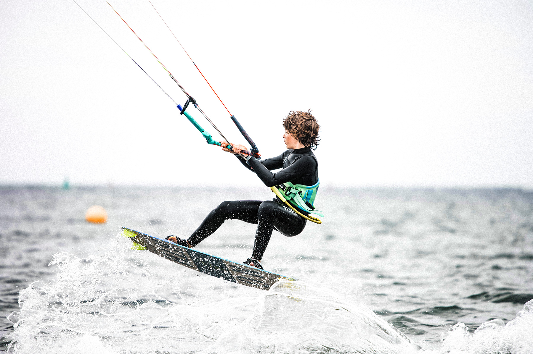 Boy kitesurfing