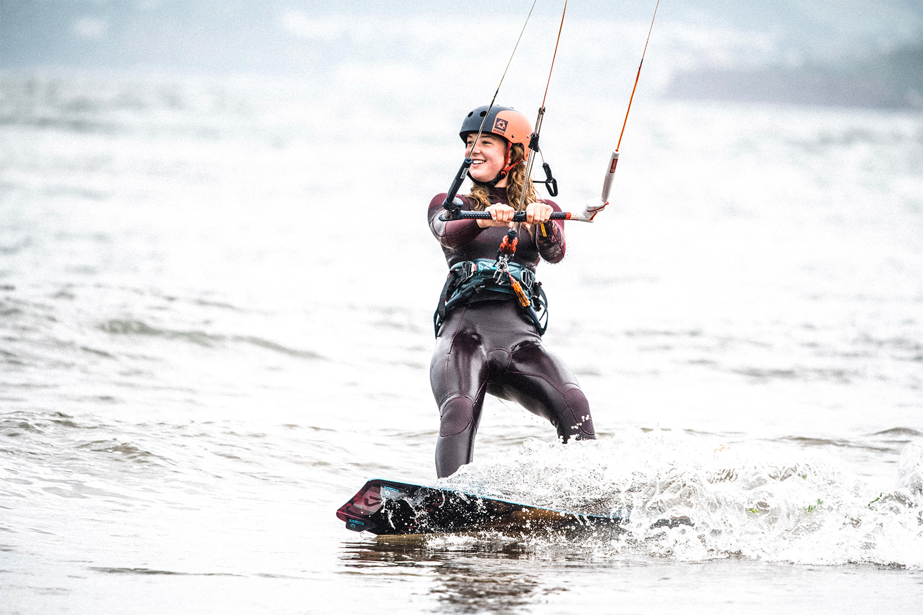 Girl kitesurfing