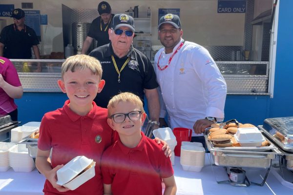 Team Michael Caines Joins with Team Exeter Chiefs to Serve Exeter School Children and Families.